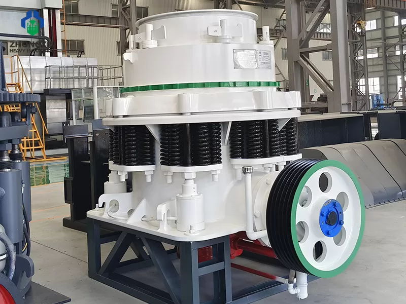 Symons 4 1/4 cone crusher side view showing flywheel and drive system