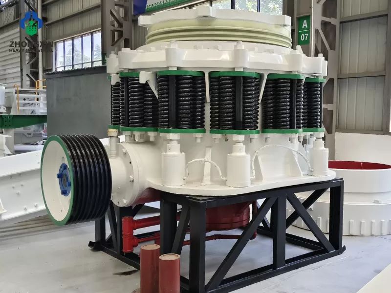 Secondary cone crusher side view showing flywheel and belt drive system
