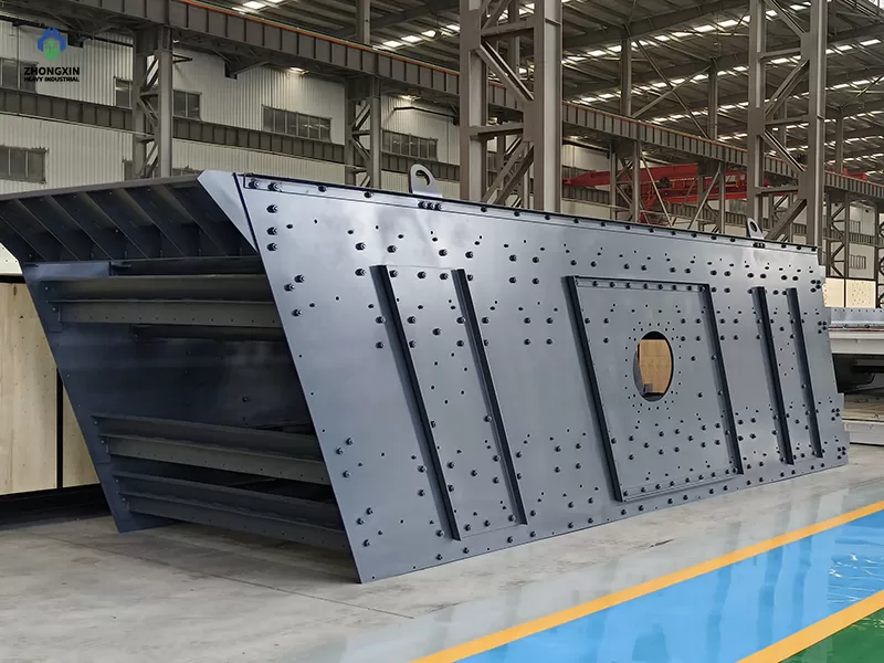 Inclined vibrating screen side view showing eccentric shaft and motor drive