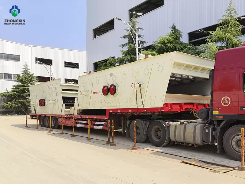Mining vibrating screen loaded on trailer for delivery to customer site