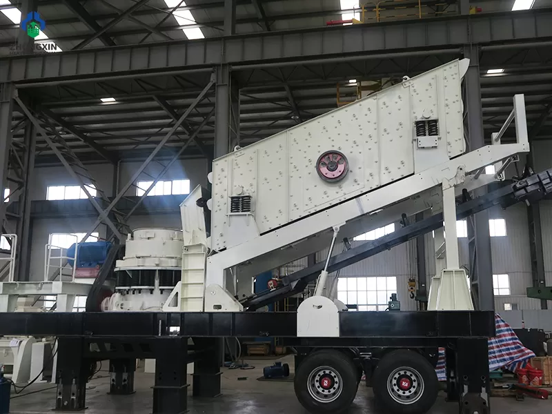 Mobile crusher plant screen deck and discharge conveyors close-up