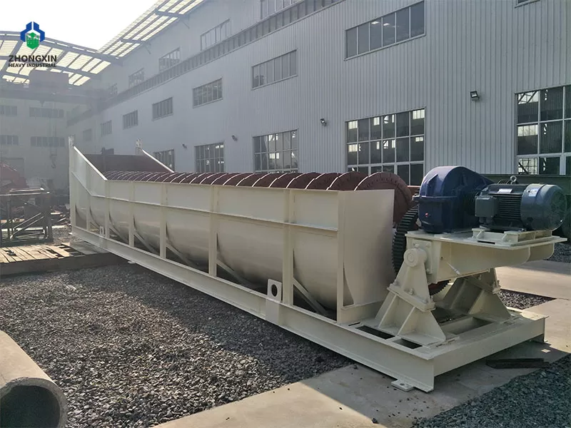 Heavy duty solid screw shaft with wear resistant shoe liners under assembly at the factory.