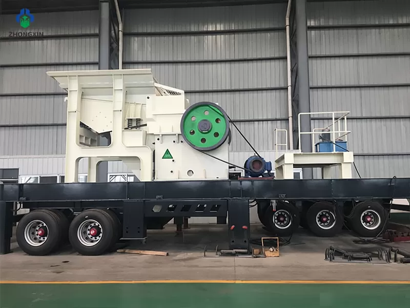 Mobile rock crusher for sale feed hopper and vibrating feeder assembly