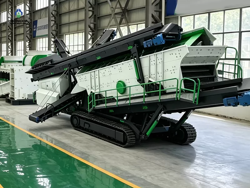 Crawler mobile crusher plant assembled in manufacturing workshop for mining and quarry applications