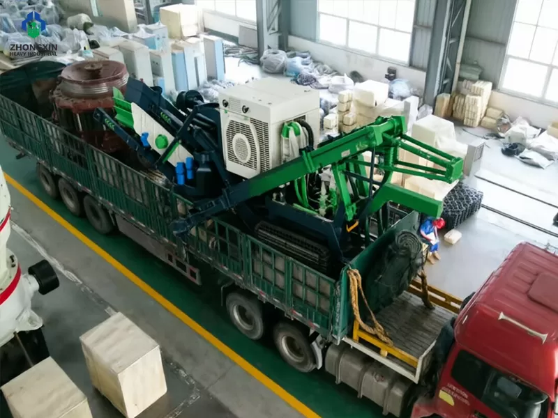 Crawler impact crusher station loaded on trailer for delivery
